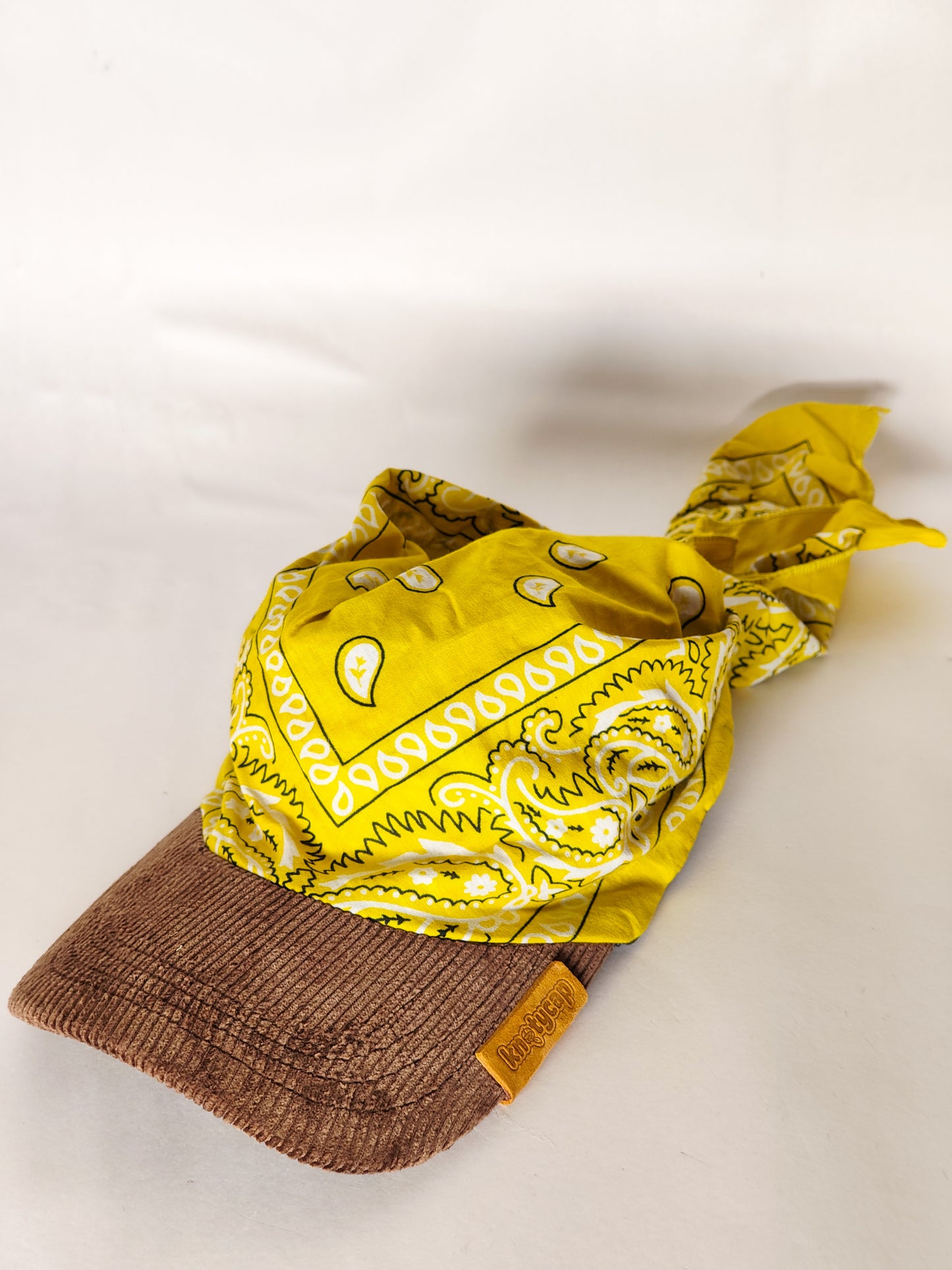 Kapri™ – Brown Corduroy Brim × Yellow Printed Bandana (OG Drop)
