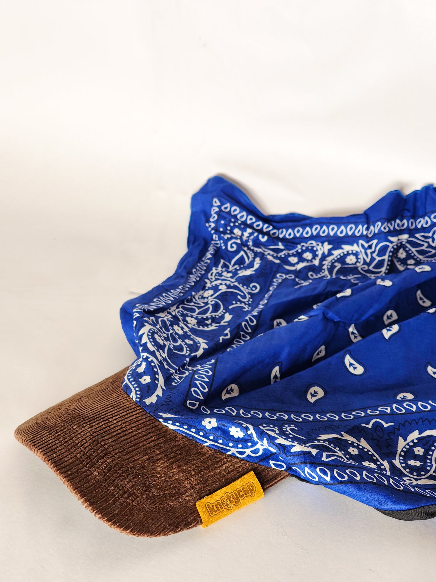 Kapri™ – Brown Corduroy Brim × Blue Printed Bandana (OG Drop)