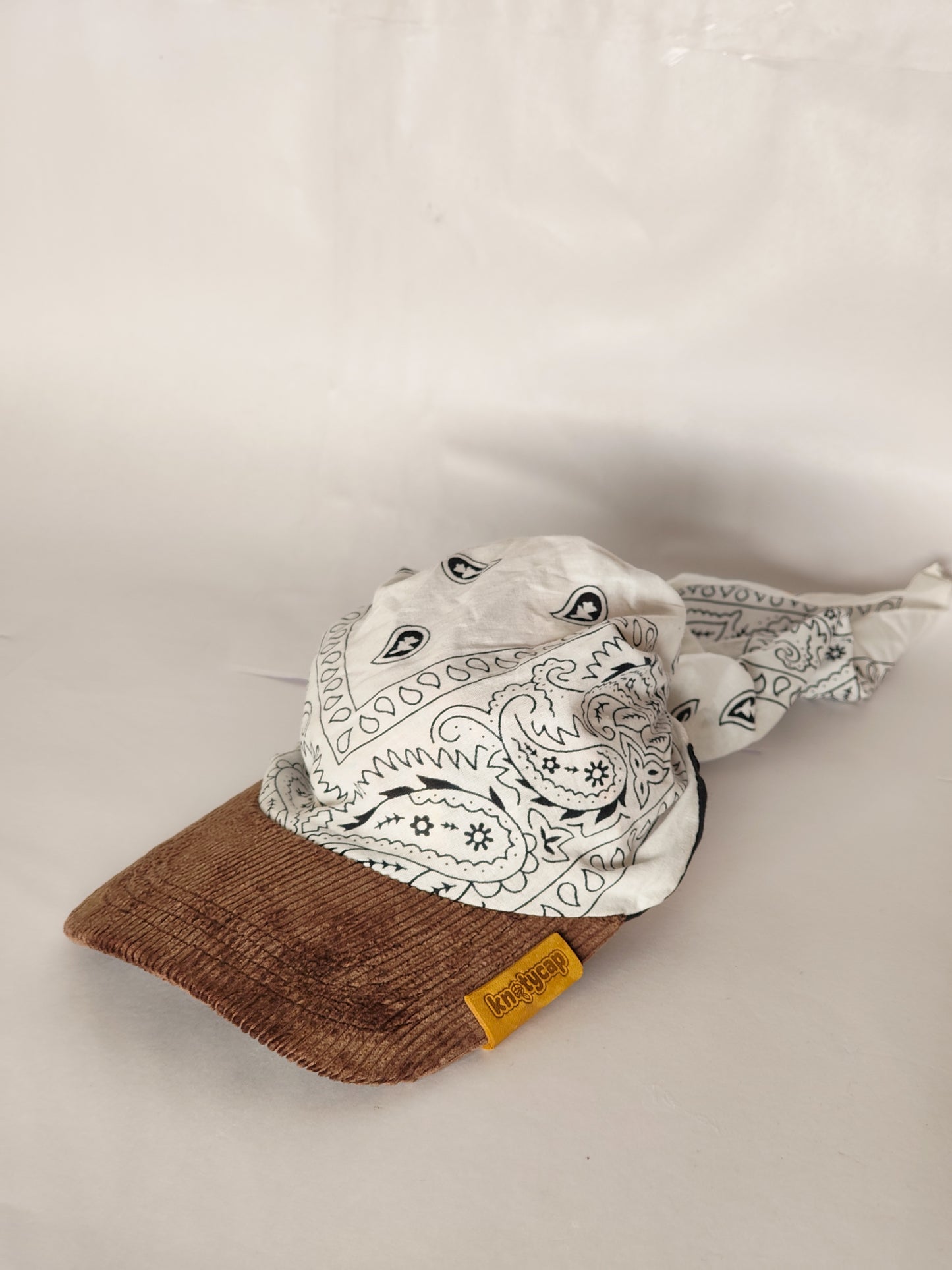 Kapri™ – Brown Corduroy Brim × White Printed Bandana (OG Drop)