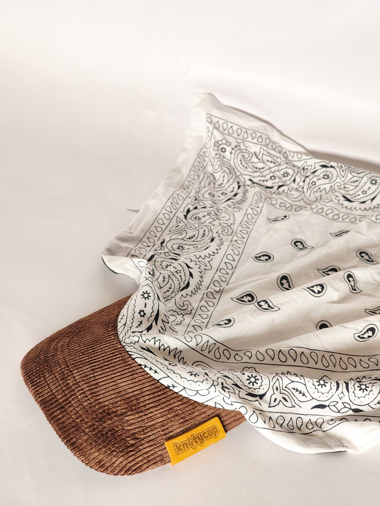 Kapri™ – Brown Corduroy Brim × White Printed Bandana (OG Drop)