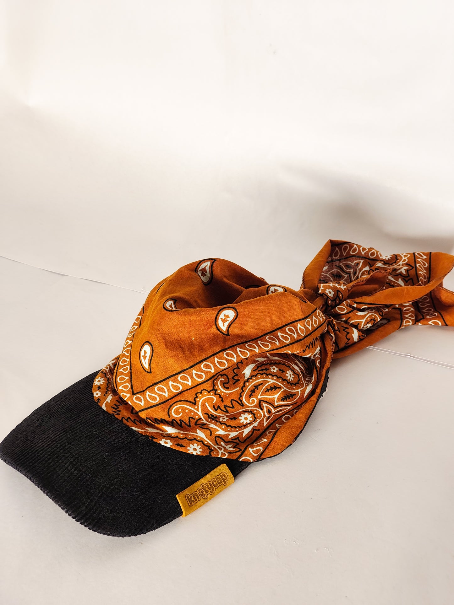 Kapri™ – Black Corduroy Brim × Orange Printed Bandana (OG Drop)