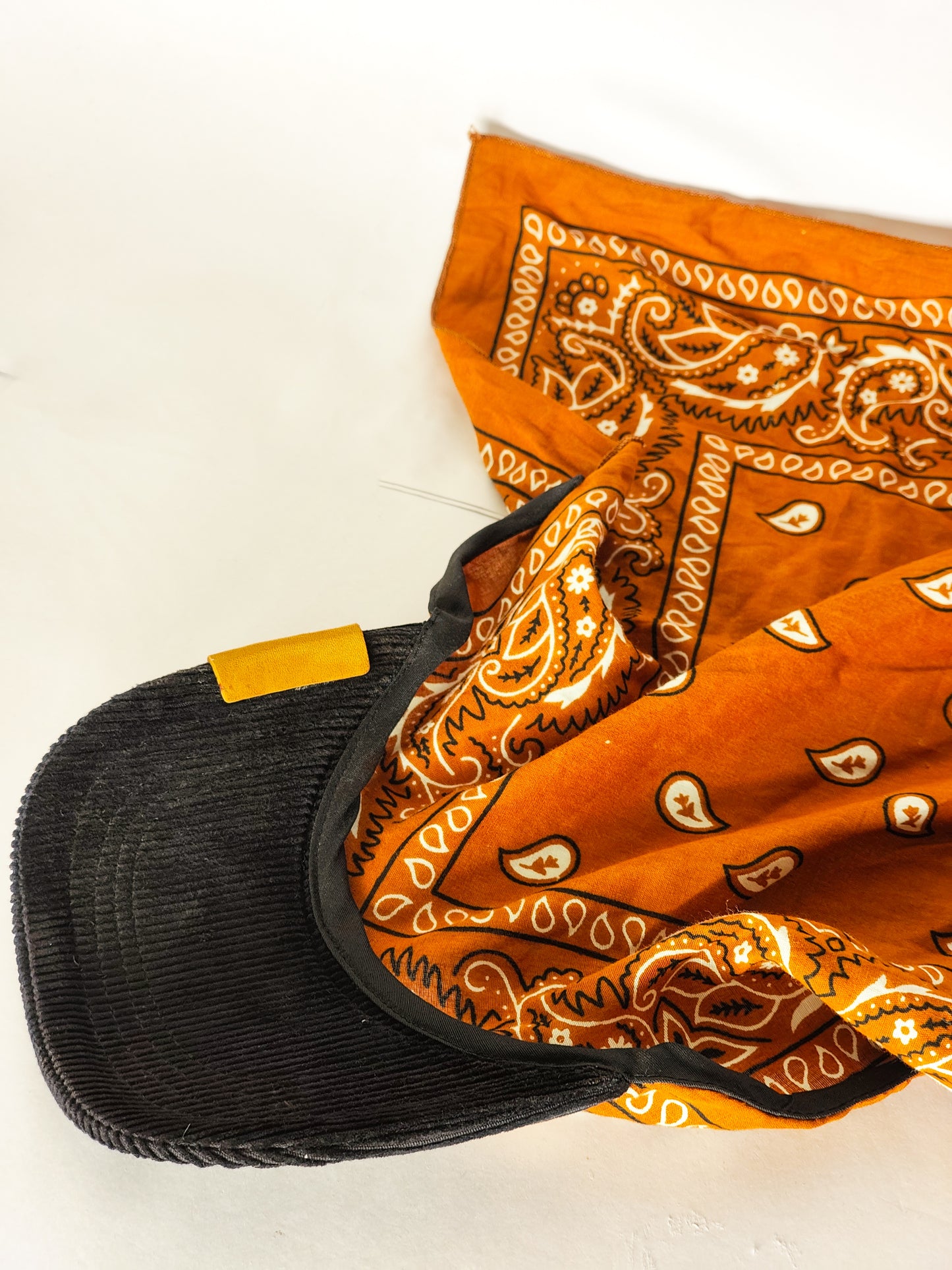 Kapri™ – Black Corduroy Brim × Orange Printed Bandana (OG Drop)