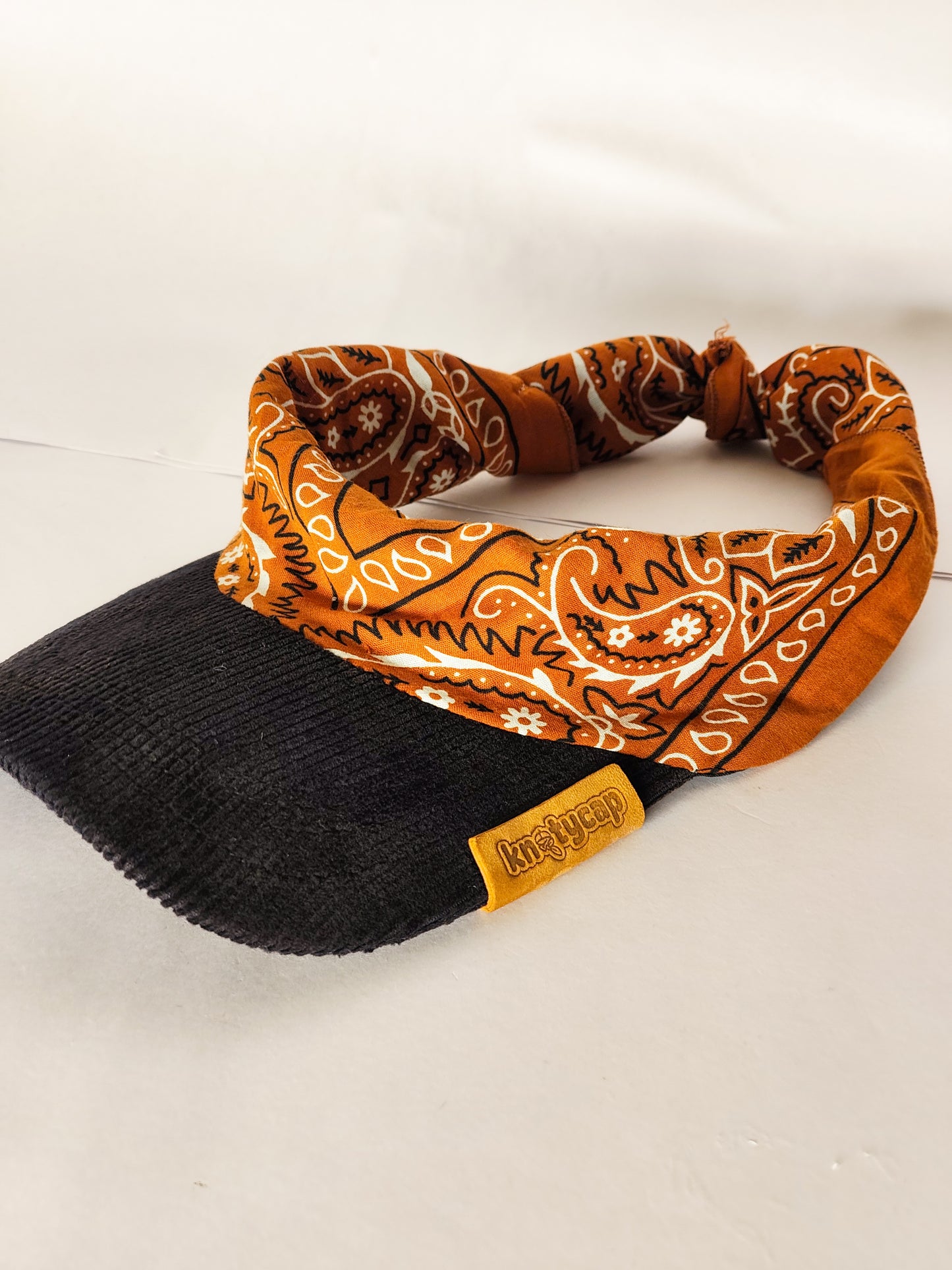 Kapri™ – Black Corduroy Brim × Orange Printed Bandana (OG Drop)