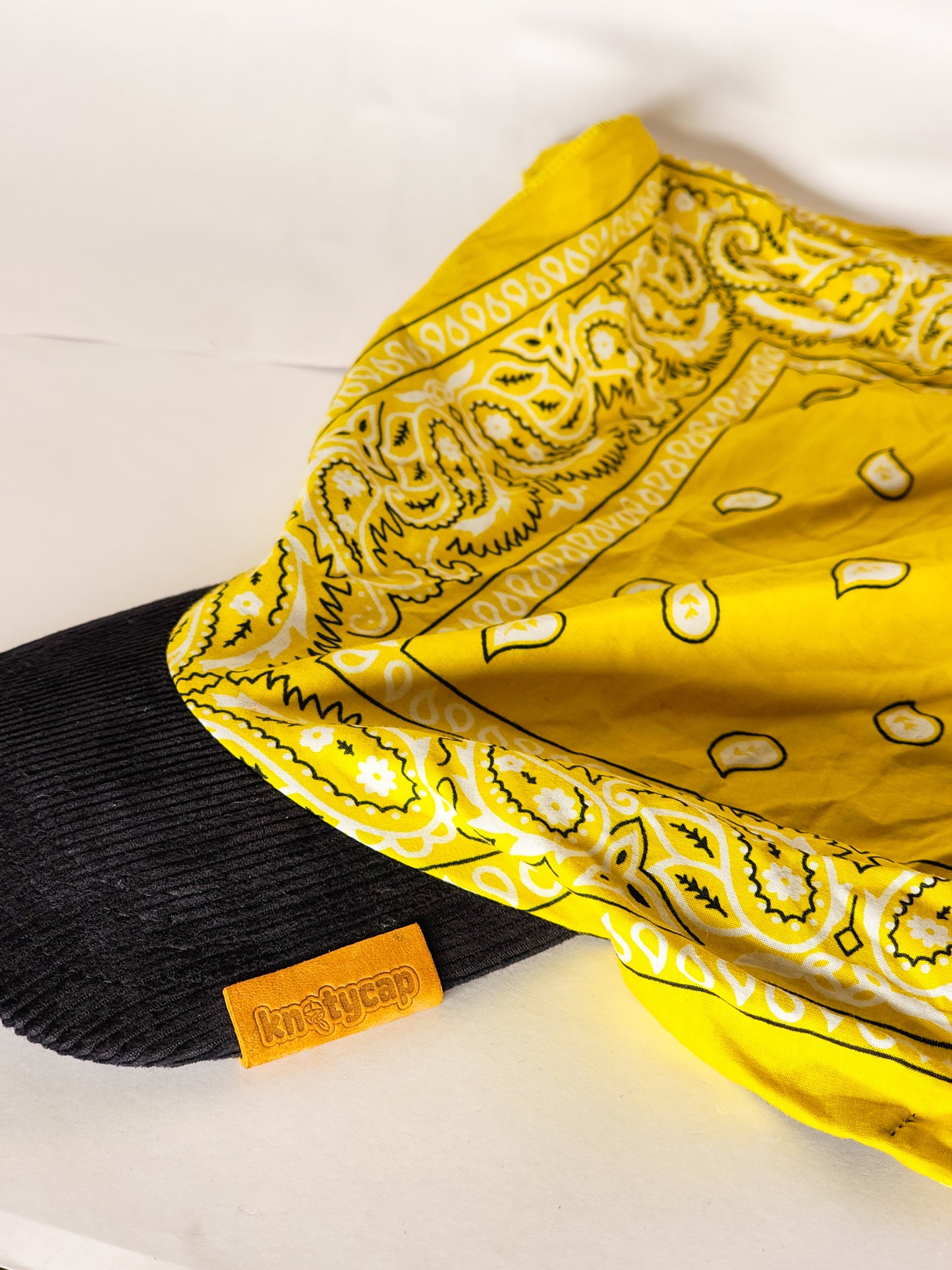 Kapri™ – Black Corduroy Brim × Yellow Printed Bandana (OG Drop)