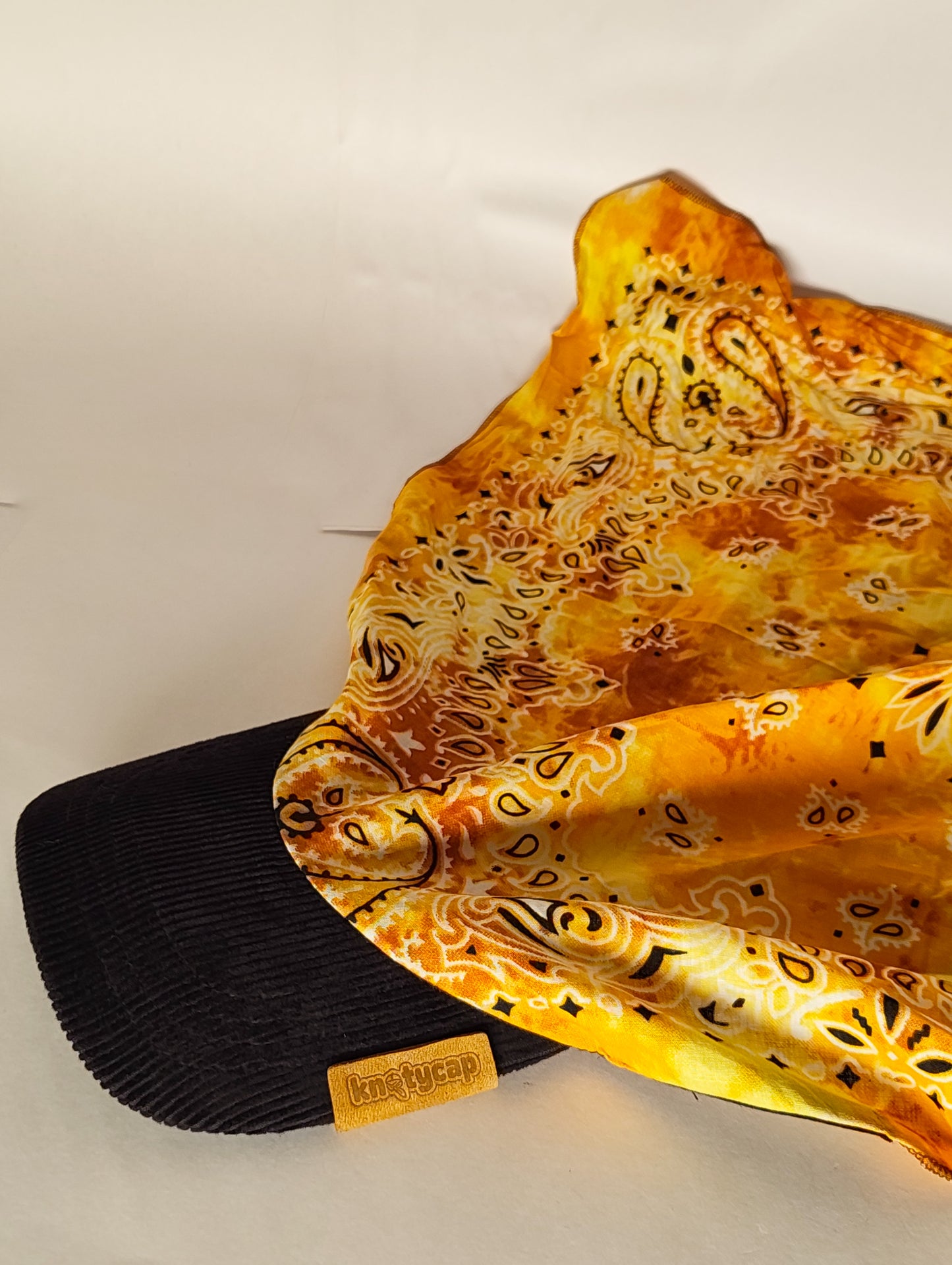 Kapri™ – Black Corduroy Brim × Saffron Printed Bandana (OG Drop)