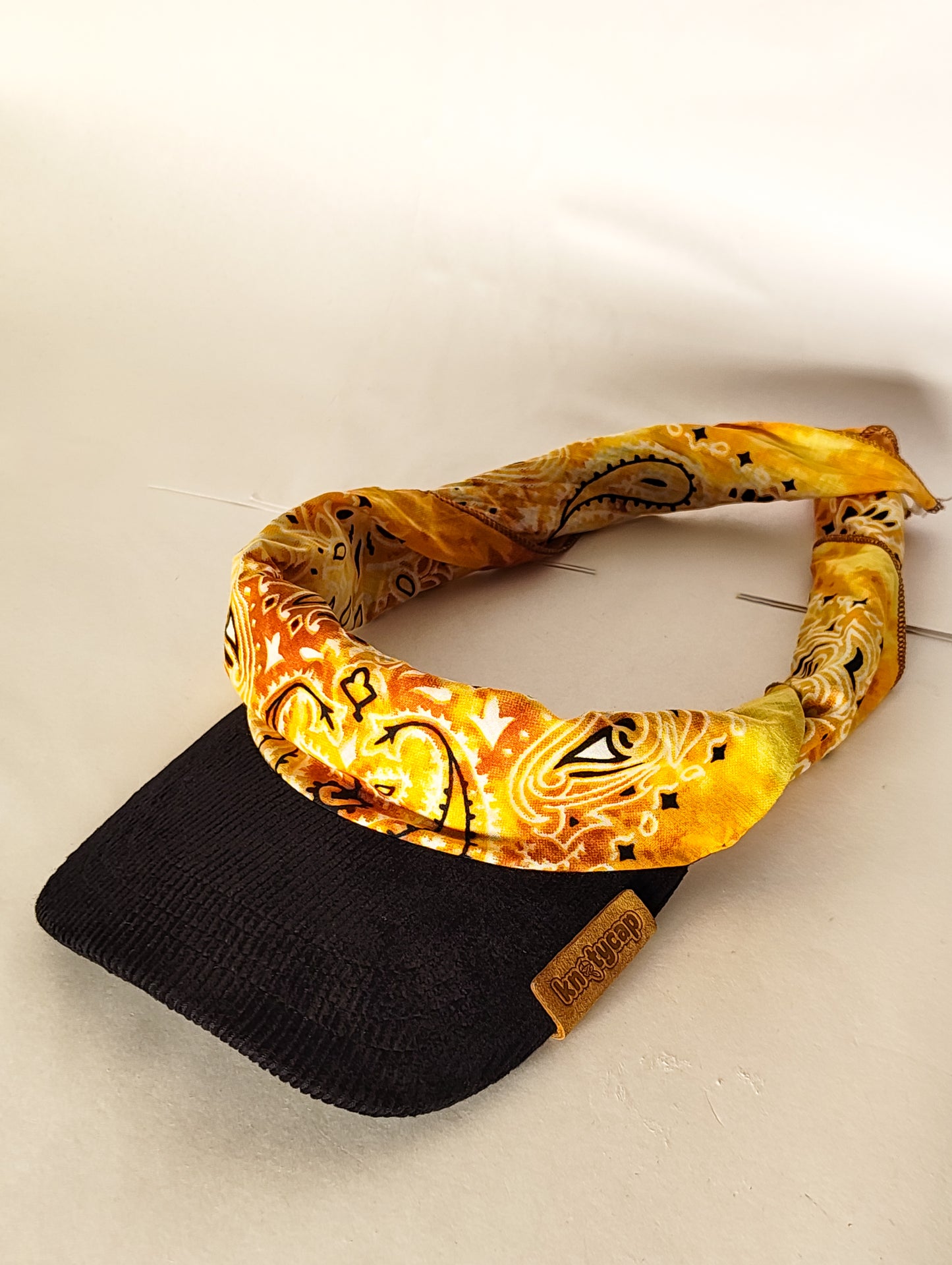 Kapri™ – Black Corduroy Brim × Saffron Printed Bandana (OG Drop)